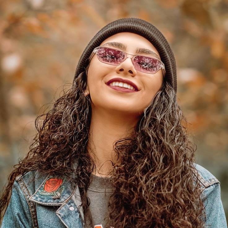 Avery Chen, Lead Design Curator at Verdant & Vine, reviewing corporate floral arrangements